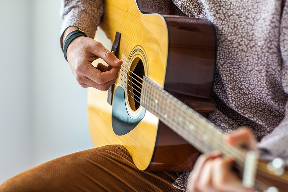 Learn to play a music instrument while at home - Tips on Being Productive At Home - Carousell Philippines Blog